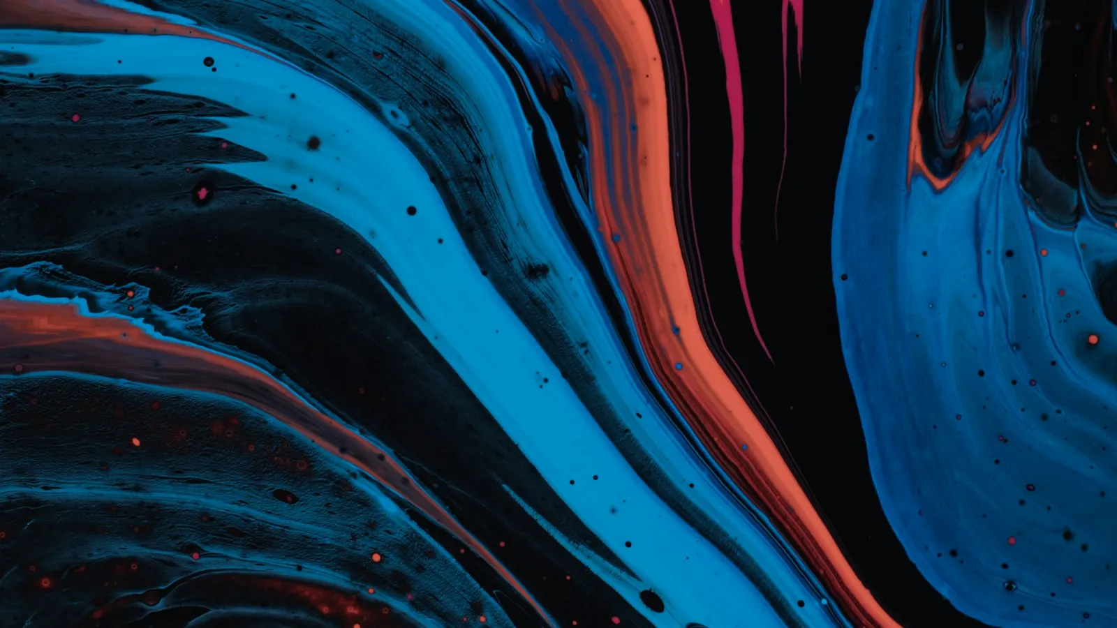 Abstract fluid artwork in orange, blue and black